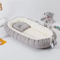 Cuna de viaje portátil con cambiador y almohada integrada