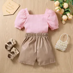 Conjunto niña de algodón rosa veraniego con blusa manga globo y short