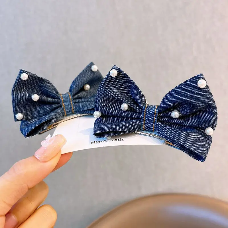 Pinzas para el pelo con lazo vaquero y perlas de niña - imagen 2