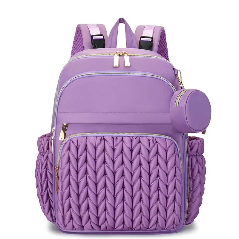 Mochila pañales con cambiador y accesorios para bebé en marcha - imagen 3