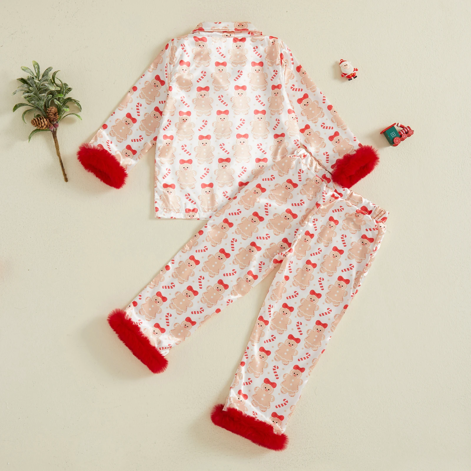 Pijama satén navideña para niña – Estampado festóngingerbread