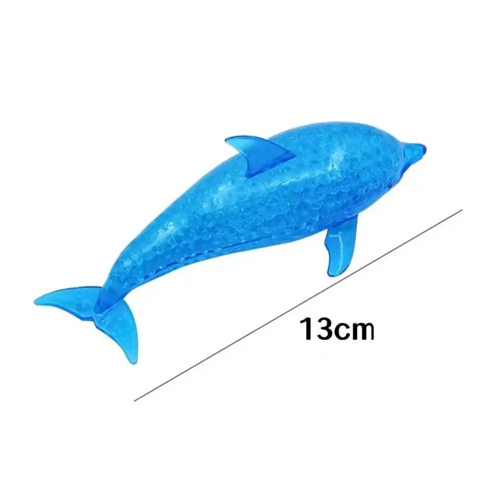 Pelota antiestrés azul con forma de tiburón