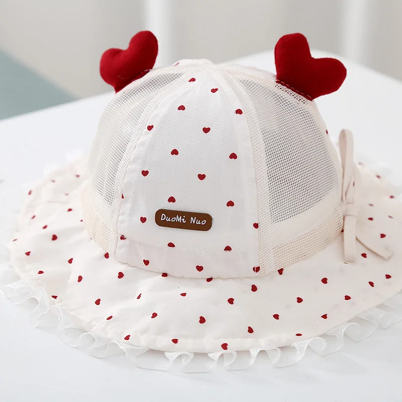 Gorro de pescador en malla para bebé con protección solar
