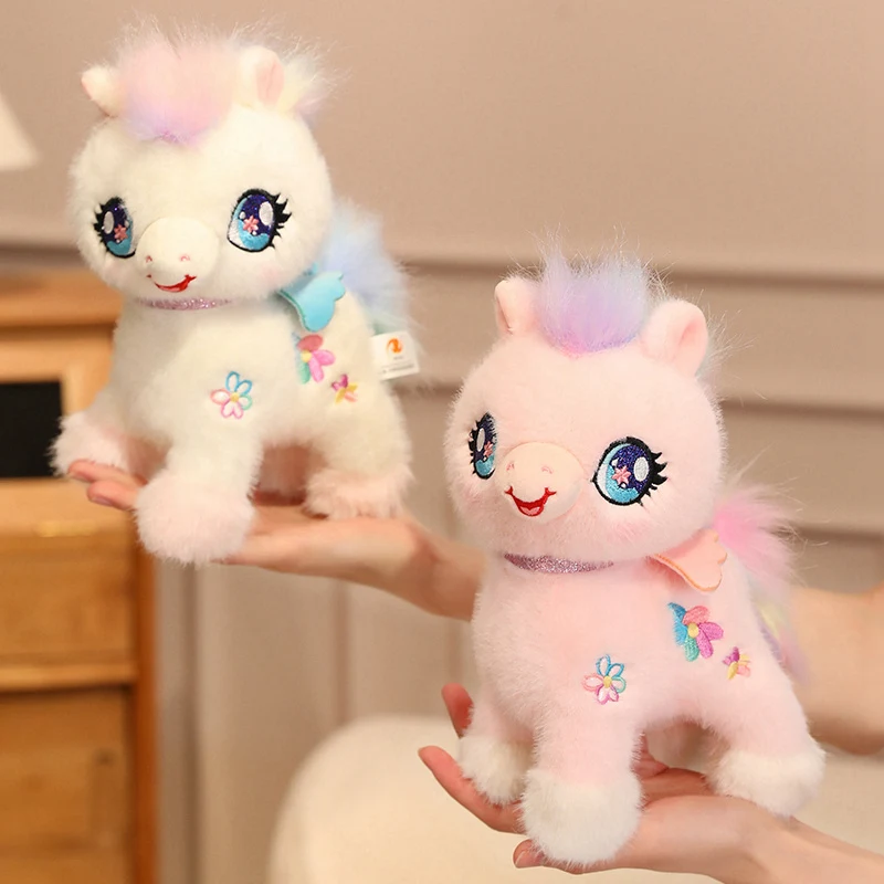 Peluche unicornio rosa y blanco suave con alas arcoíris - imagen 3