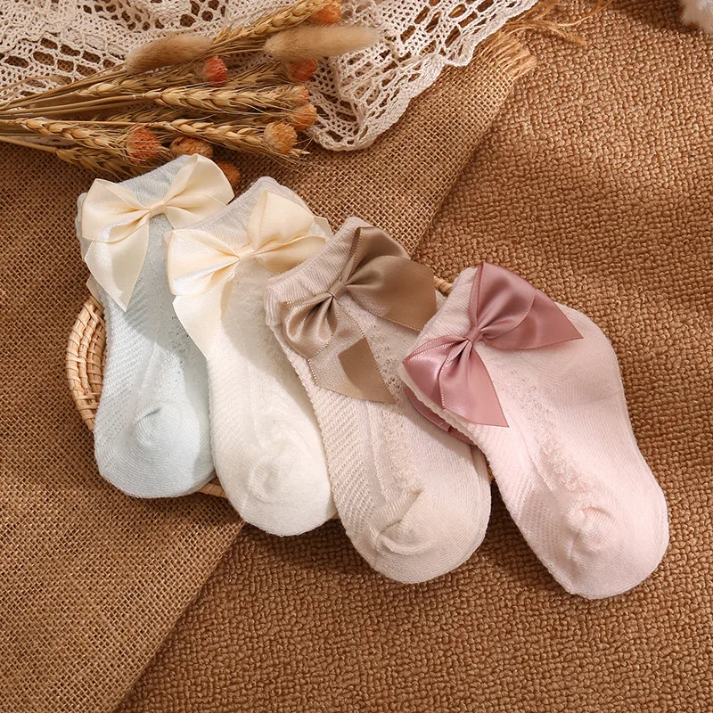 Calcetines de malla con lazo para bebé