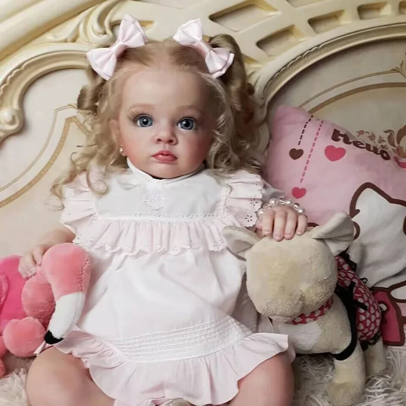 Bebé Reborn Tutti en posición sentada