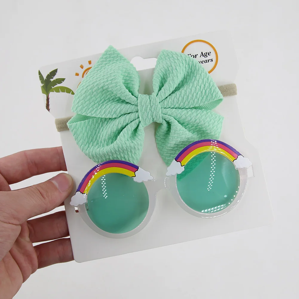 Set de gafas de sol arco iris y gomas elásticas para bebé - imagen 3