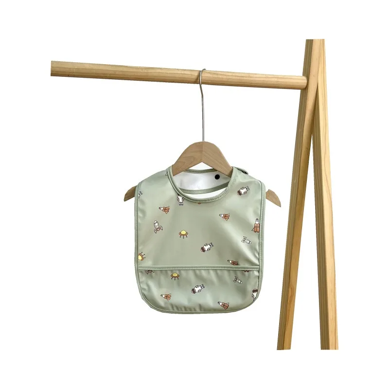 Baberos impermeables de PU para bebé con dibujos animados y bolsillo