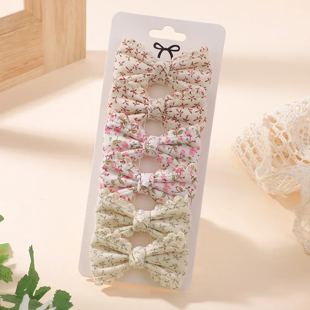 Lazo con detalle floral en tono pastel