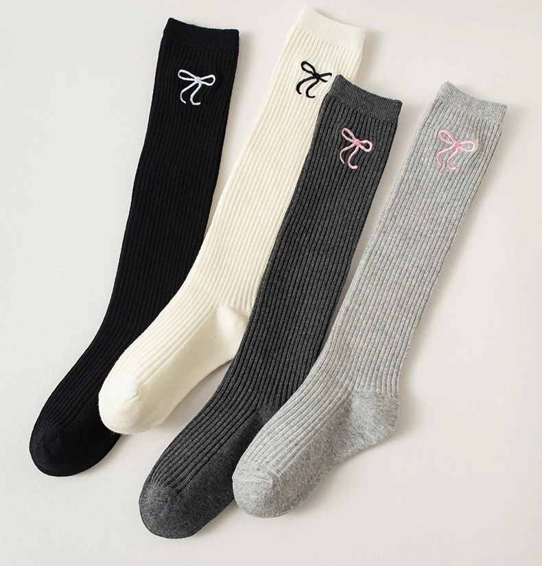 Calcetines infantiles hasta la rodilla con arco jacquard