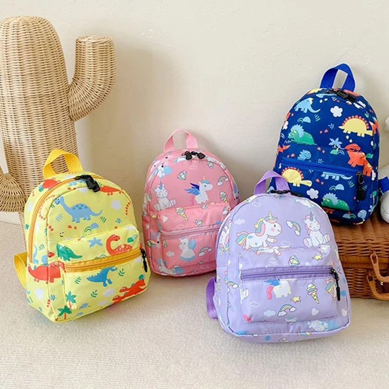 Mochila unicornio dinosaurio frontal