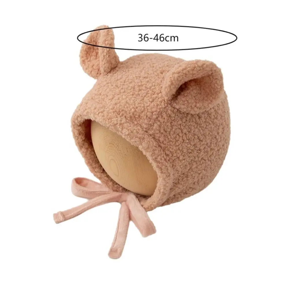 Gorro infantil de invierno en color beige con orejas