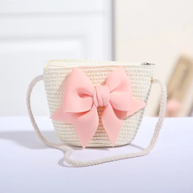 Bolso de paja con lazo para niña – estilo cruzado tejido a mano