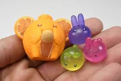 Stasto Cápsula de Piedra Figuras Animales Elefante y Cocodrilo