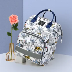 Bolso de mamá amplio con doble asa y compartimentos para bebé