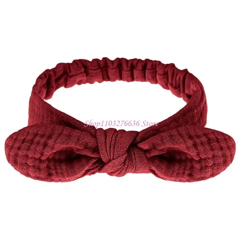 Diadema de bebé con lazo grande en tonos suaves