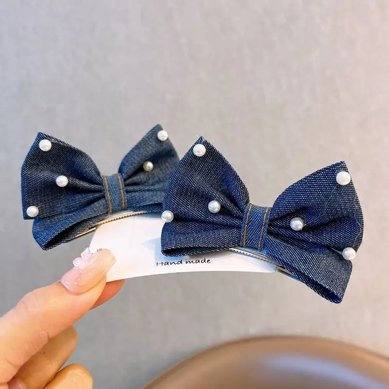 Pinzas para el pelo con lazo vaquero y perlas de niña