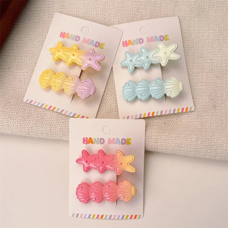 Pinza de pelo infantil con concha y estrella de mar - imagen 4