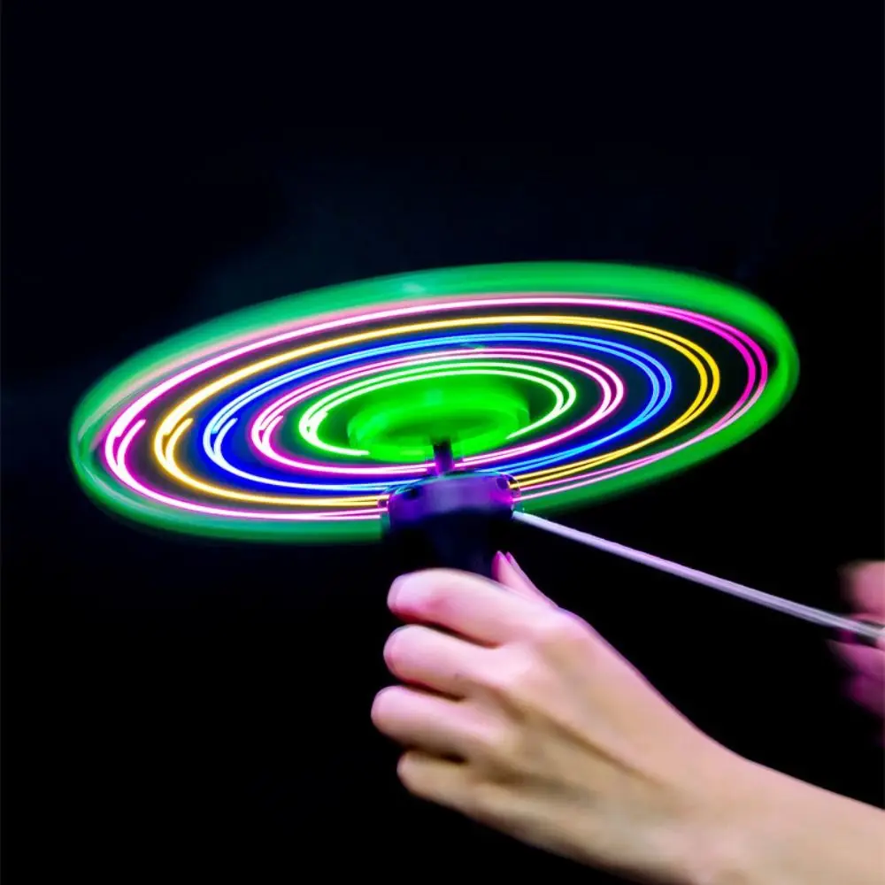 Juguete volante LED parpadeante con cuerda y giro para parques - imagen 2