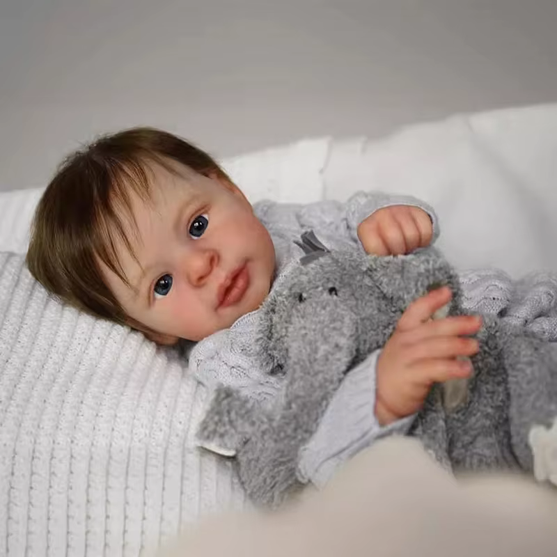 Muñeca Reborn realista con piel 3D y ropa de bebé
