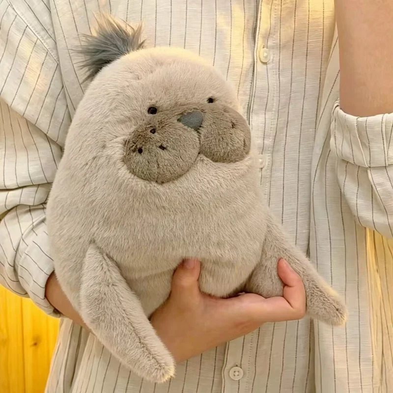 Peluche de foca gris suave con ojos grandes para regalar