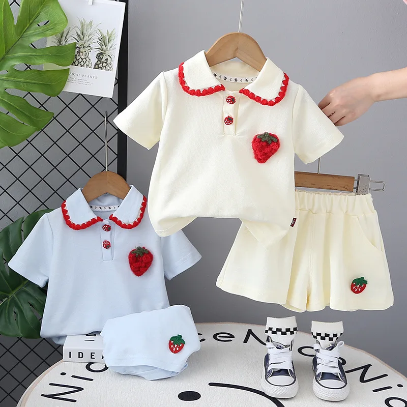 Polo con estampado de fresas para niña