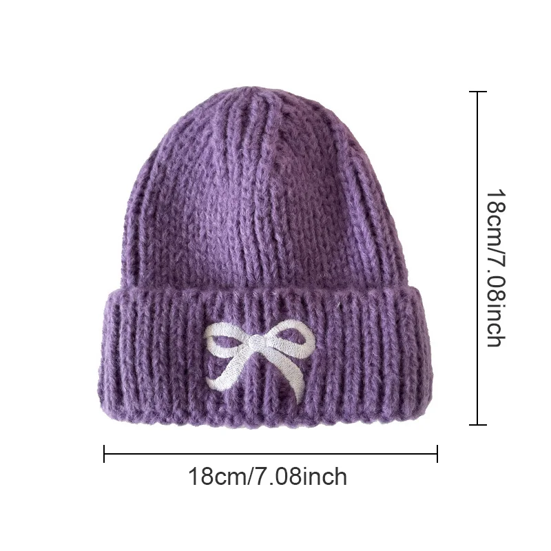 Gorro de invierno tejido con lazo bordado y orejeras para bebé - imagen 4