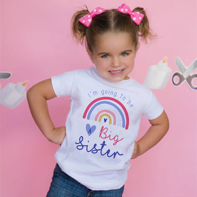 Camiseta hermana mayor con anuncio de bebé – arcoíris
