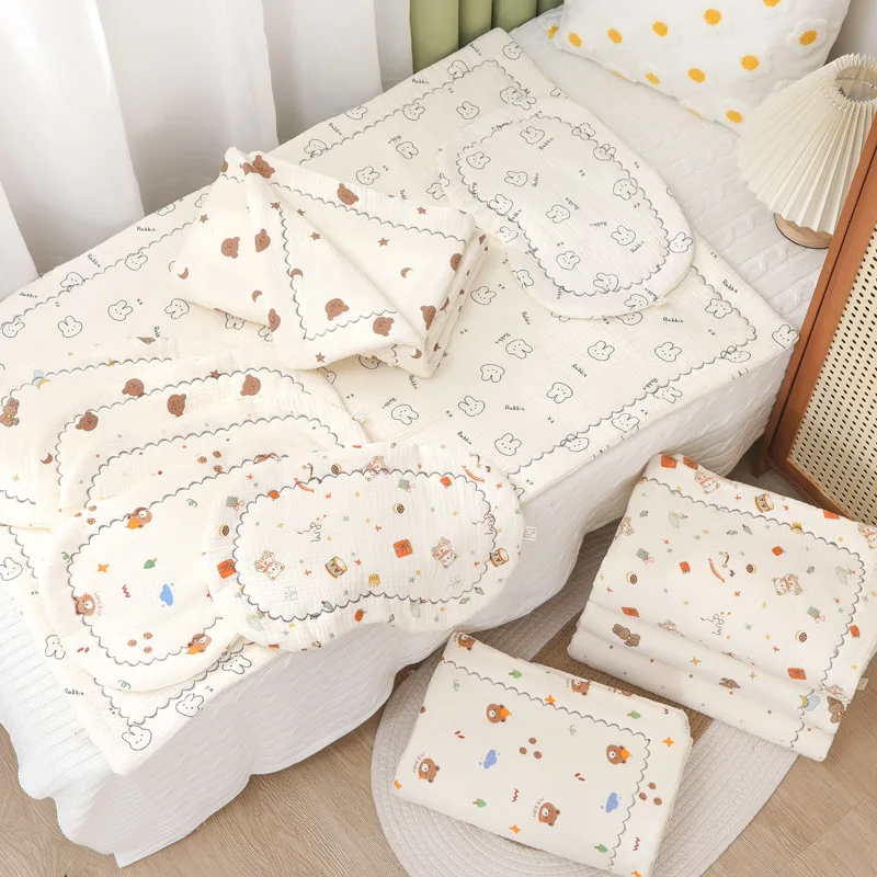 Juego de colchón para cama de bebé con almohada y sábanas coordinadas