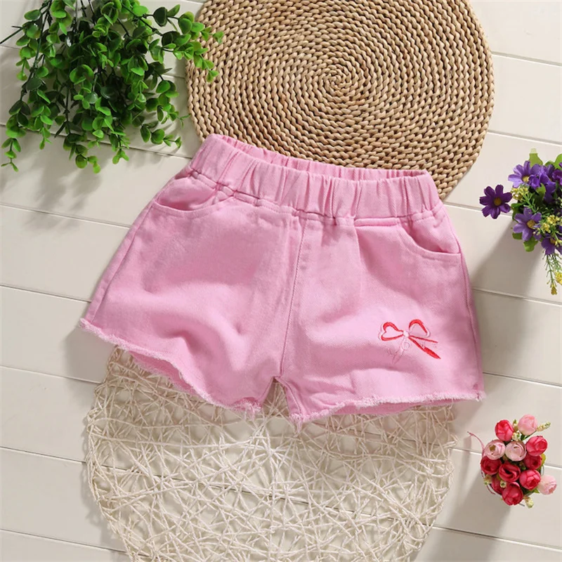 Pantalones cortos vaqueros con lazo para niña – pierna ancha - imagen 2