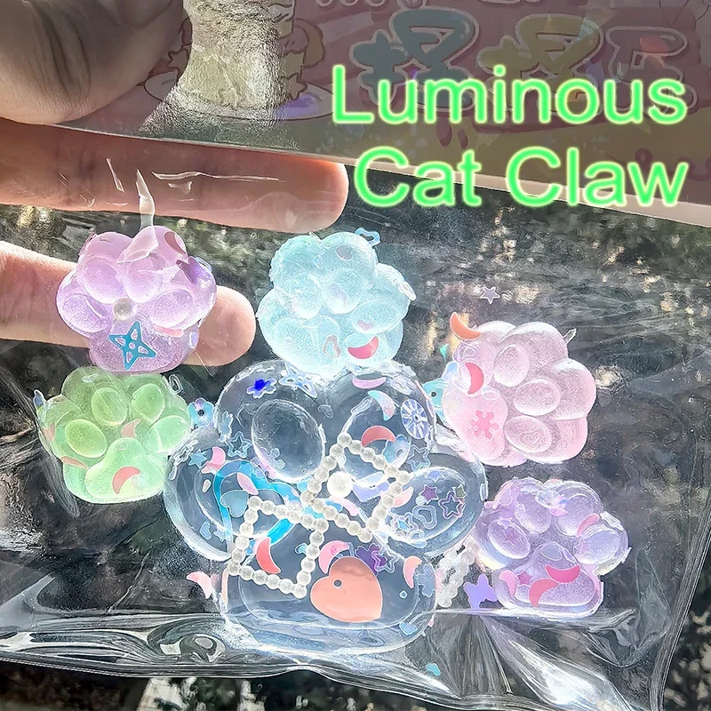 Juguete antiestrés pata de gato luminosa suave blando para apretar