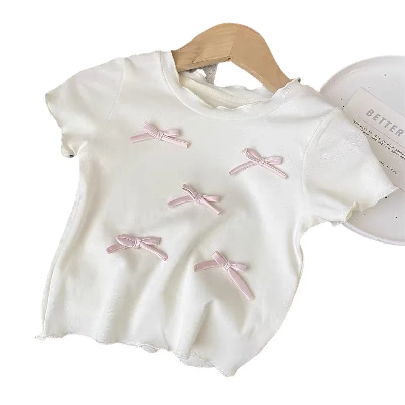 Conjunto infantil blanco-rosa con lazo: top y pantalón a cuadros - imagen 3