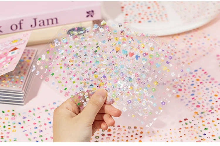 Aplicación de pegatinas en proyectos de papel