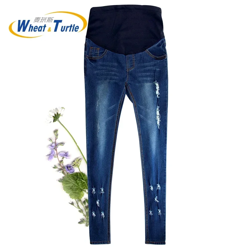 Jeans de maternidad de algodón con agujeros y bolsillos a contraste - imagen 2