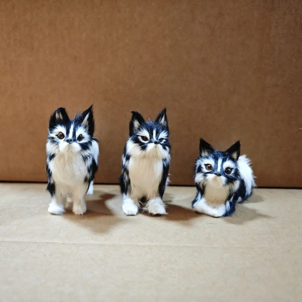 Peluche de lobo grande blanco y negro, cola y ojos expresivos - imagen 2