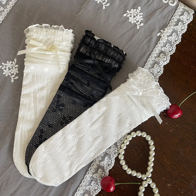 Calcetines infantiles con encaje y lazo