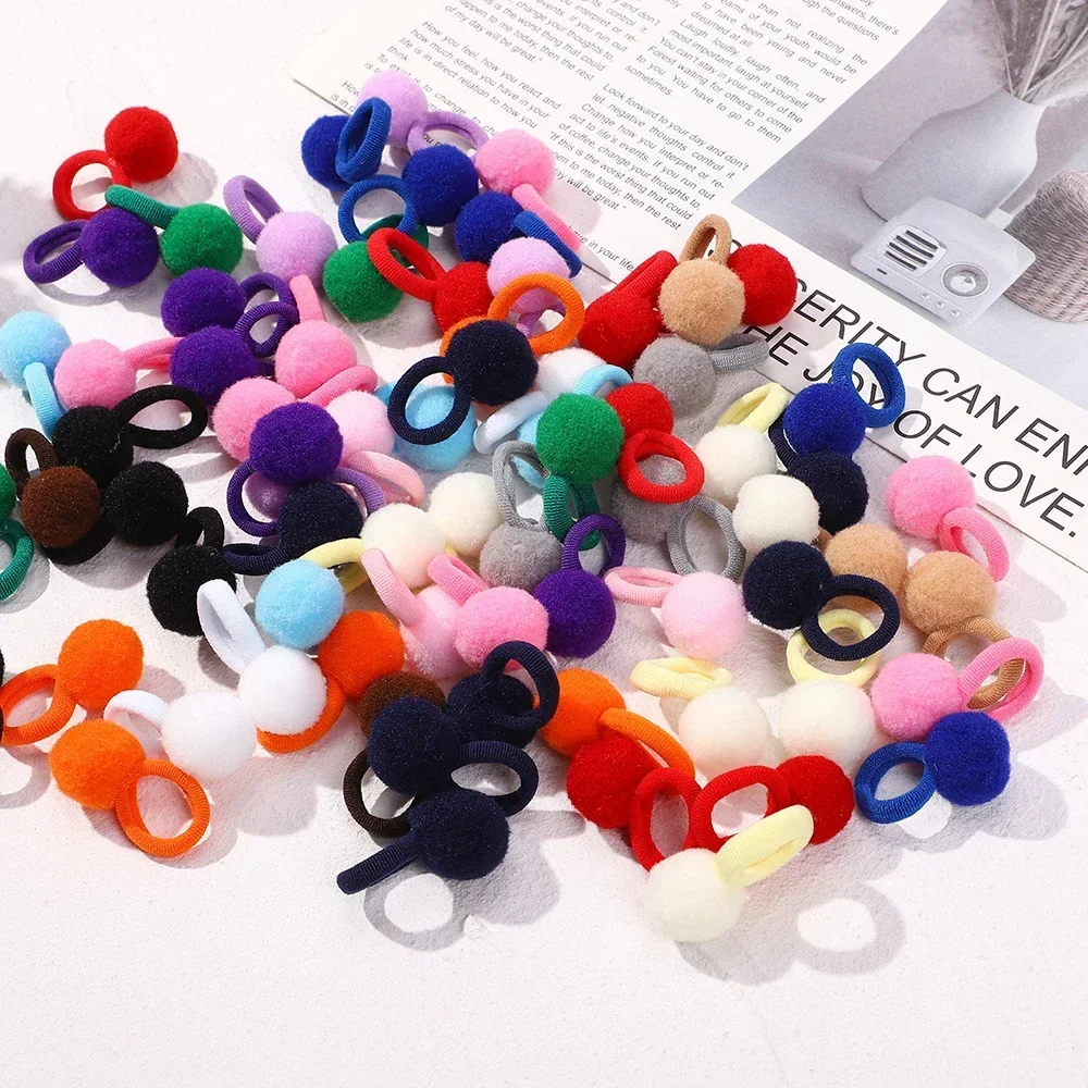 Conjunto de bandas elásticas con bolas de felpa coloridas
