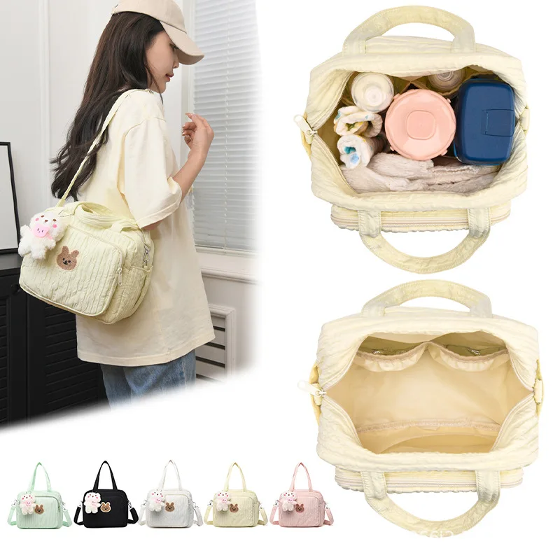 Bolsa maternal con cremallera y oso peluche