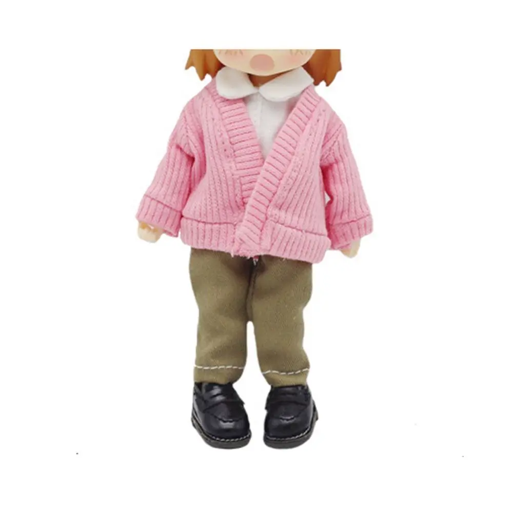 Jersey de punto caramelo artesanal para muñeca de niña