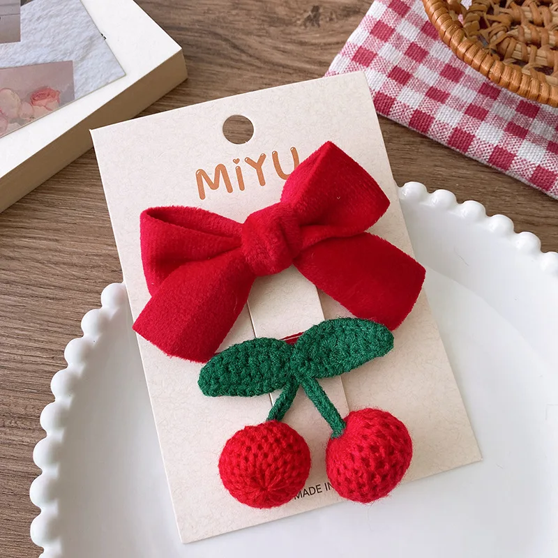 Horquillas navideñas con lazo rojo para niñas - imagen 2