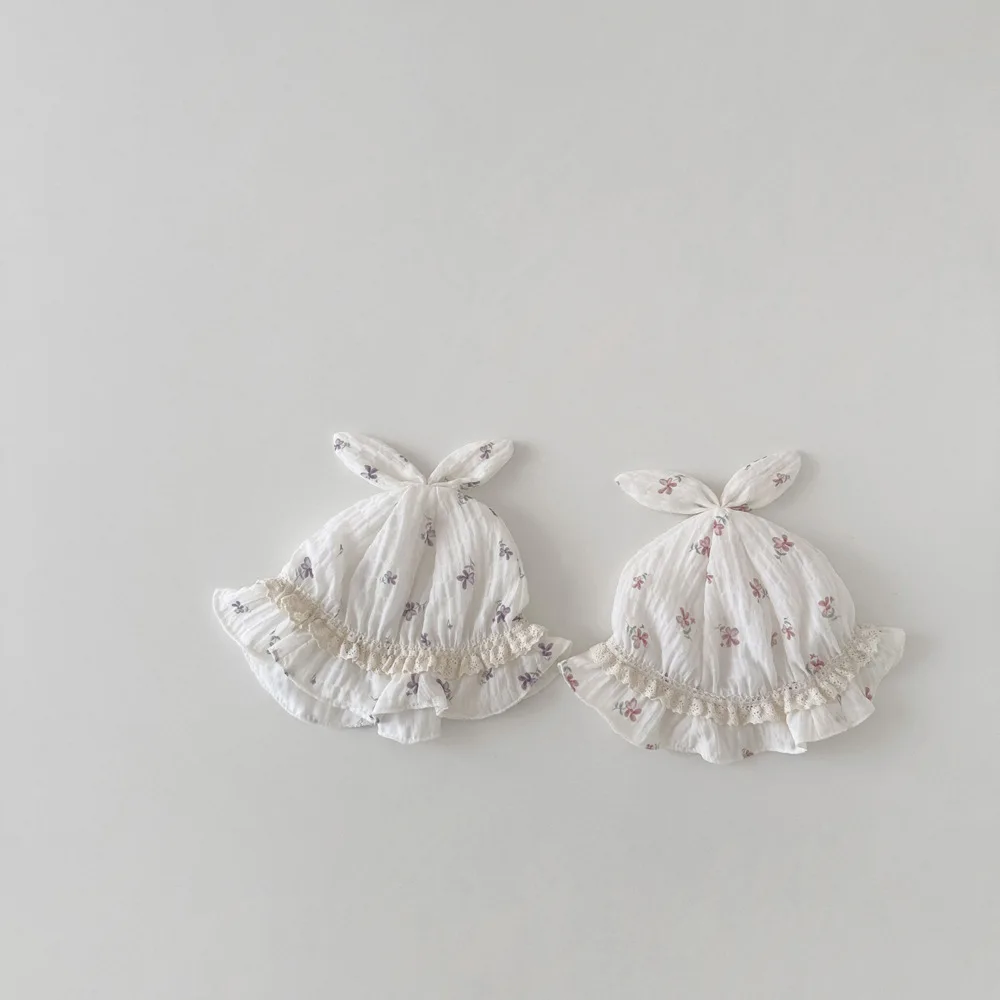 Estilo newborn con gorrito floral