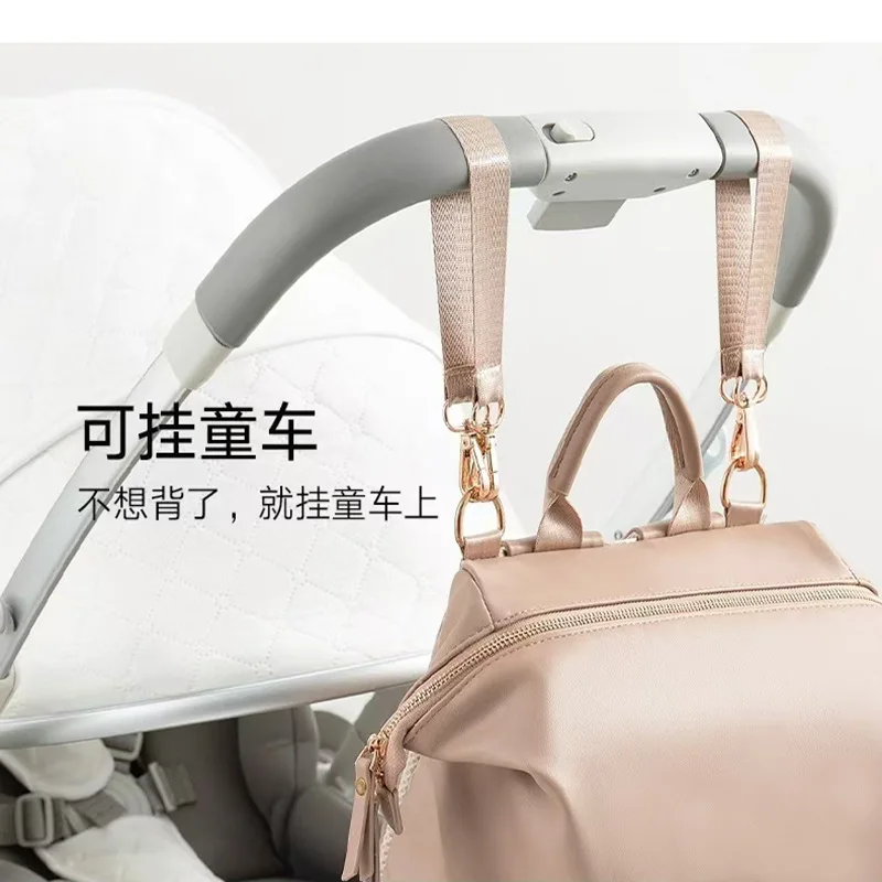 Mochila para madre y bebé con diseño de mochila