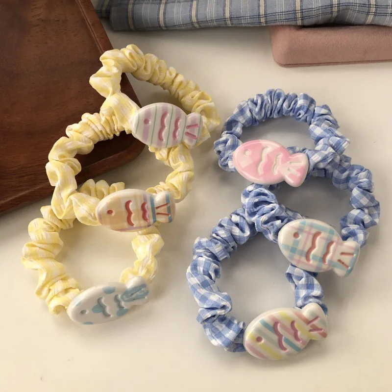 Diadema infantil con estampado de pez y rayas – Color crema - imagen 3
