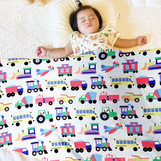 Manta Doudou extendida mostrando dimensiones