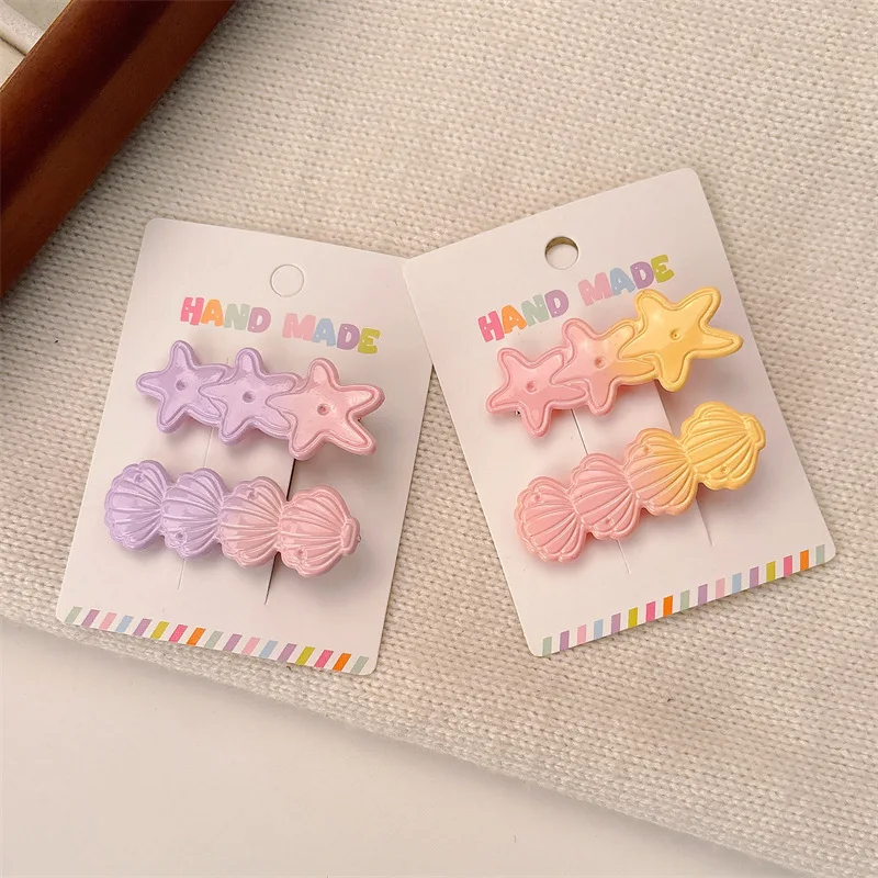 Pinza de pelo infantil con concha y estrella de mar - imagen 5