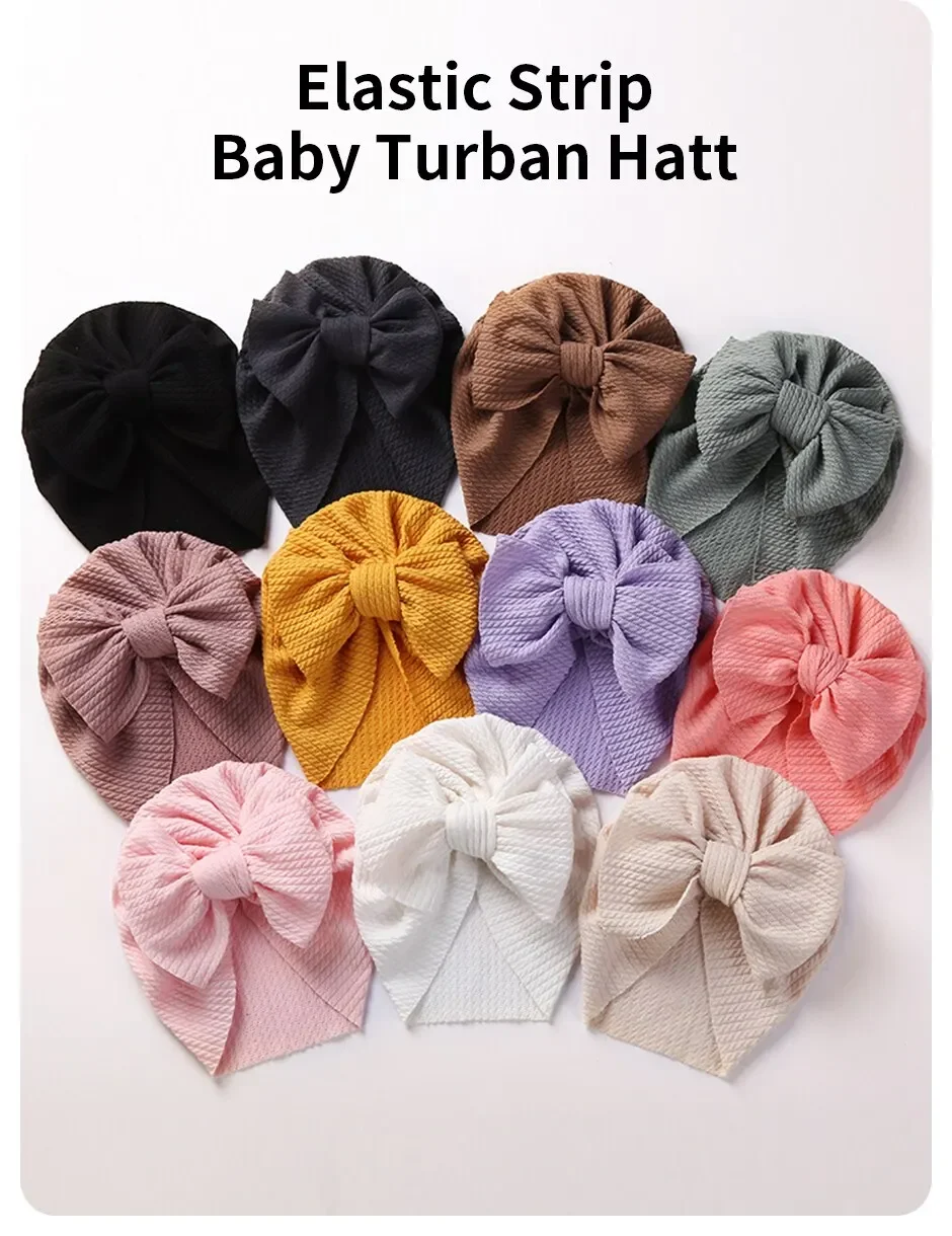 Gorro turbante con lazo visto de frente, color rosa suave