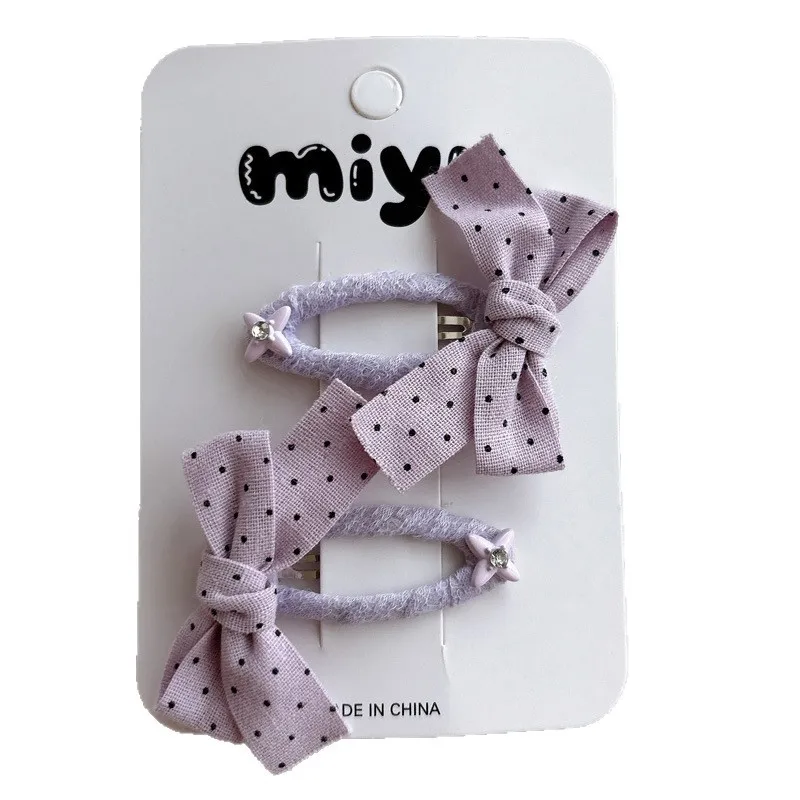 Accesorios para el cabello con lazo de lunares: pinzas y diademas - imagen 4