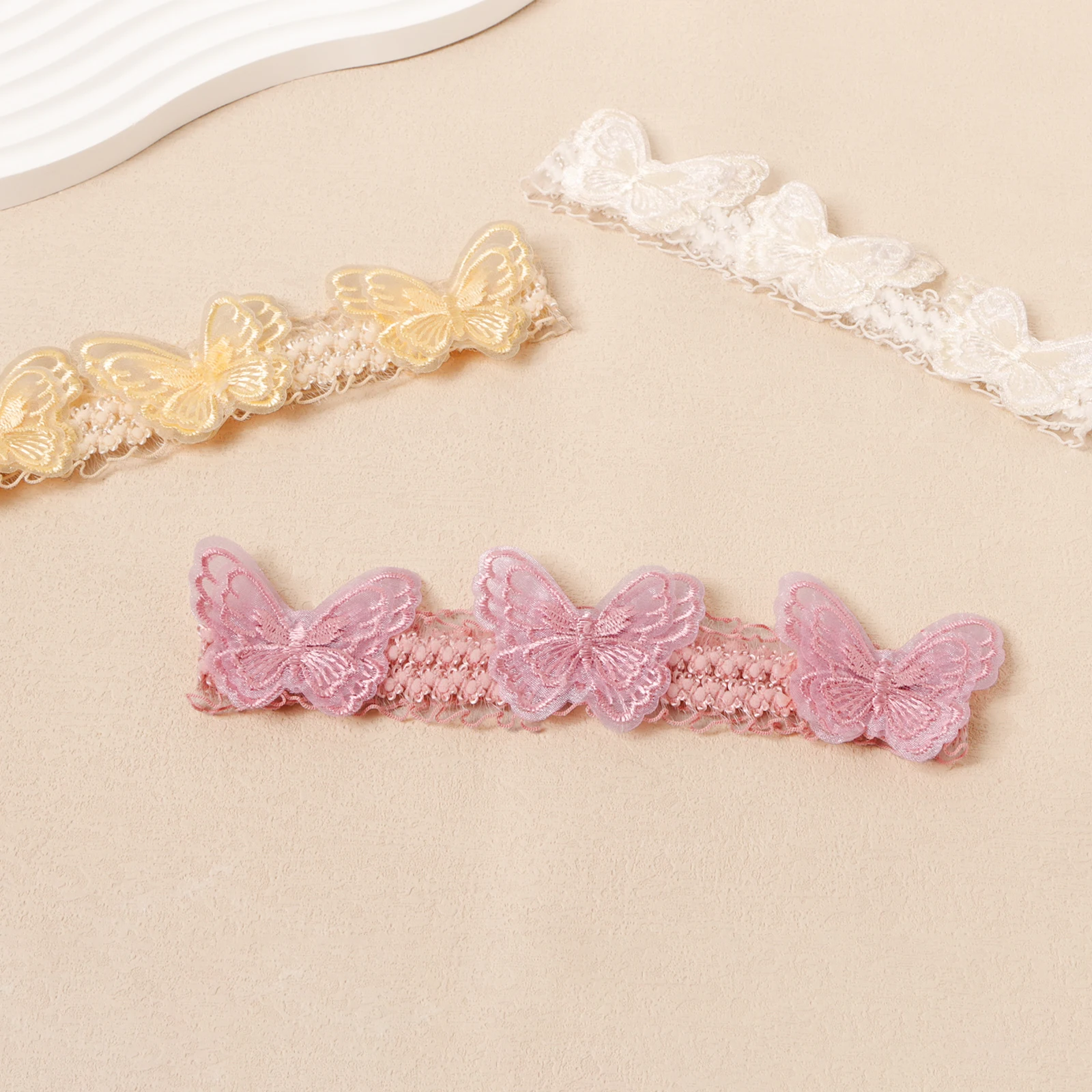 Diadema encaje suave para bebé con bordado mariposa - imagen 5
