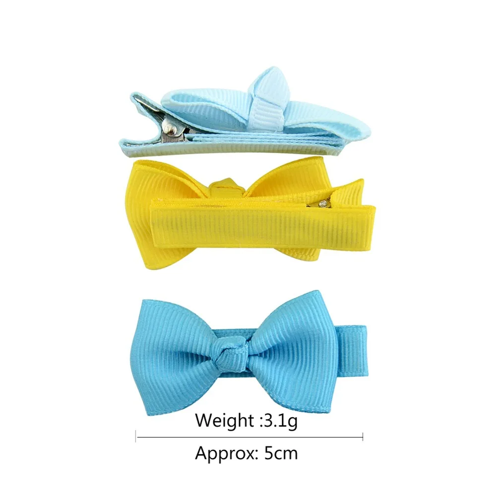 Pack de mini pinzas con lazos en varios colores