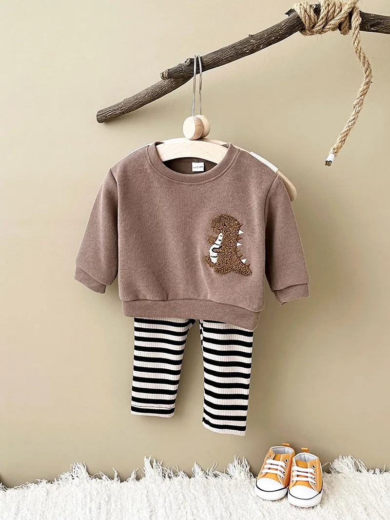 Sudadera con capucha de dinosaurio para bebé